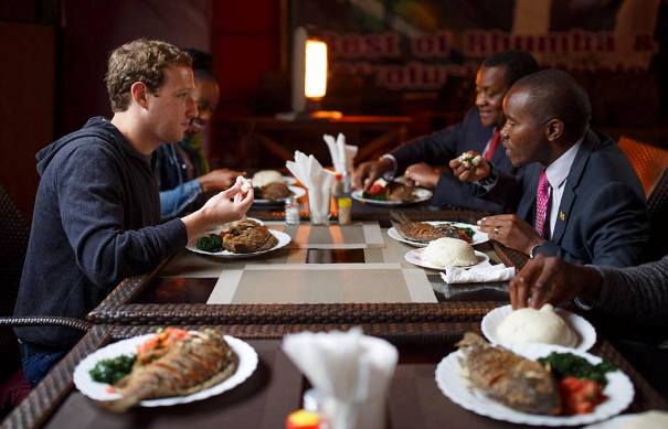 Facebook CEO eating fish in Kenya