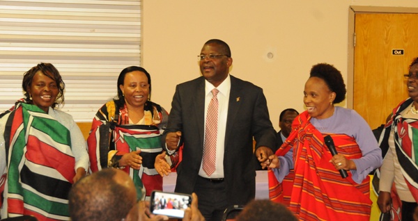 Ambassador Githae  dancing with Kenyan traditional dancers in Boston
