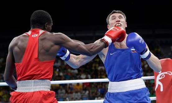 Kenyan welterweight Rayton Okwiri beats Russia's Andrei Zamkovoi