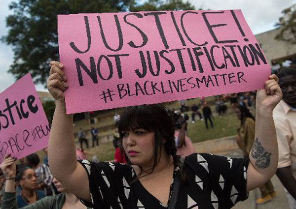 US city under emergency as violence rages