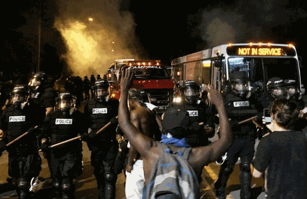Violent protests after fatal police shooting injure 12 officers