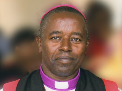 ACK Bishop charged with caressing woman's breast, attempting to kiss