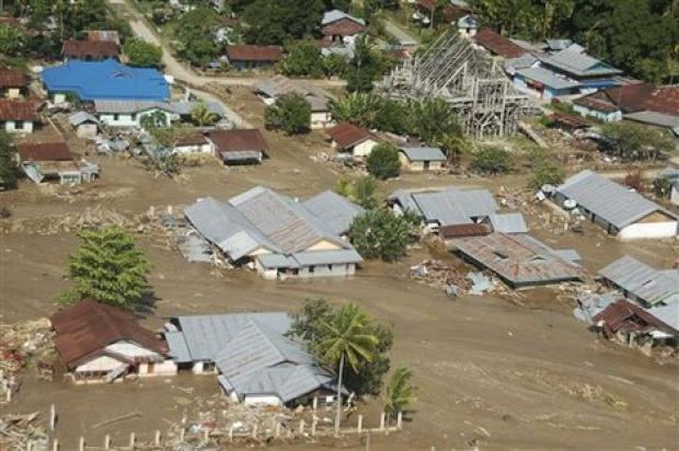 Toll at 97 in West Papua floods